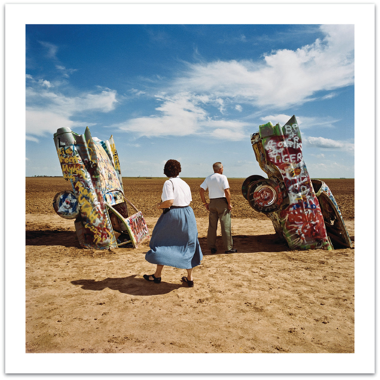 Roger Minick - Couple at Cadillac Ranch, Amarillo, 1998